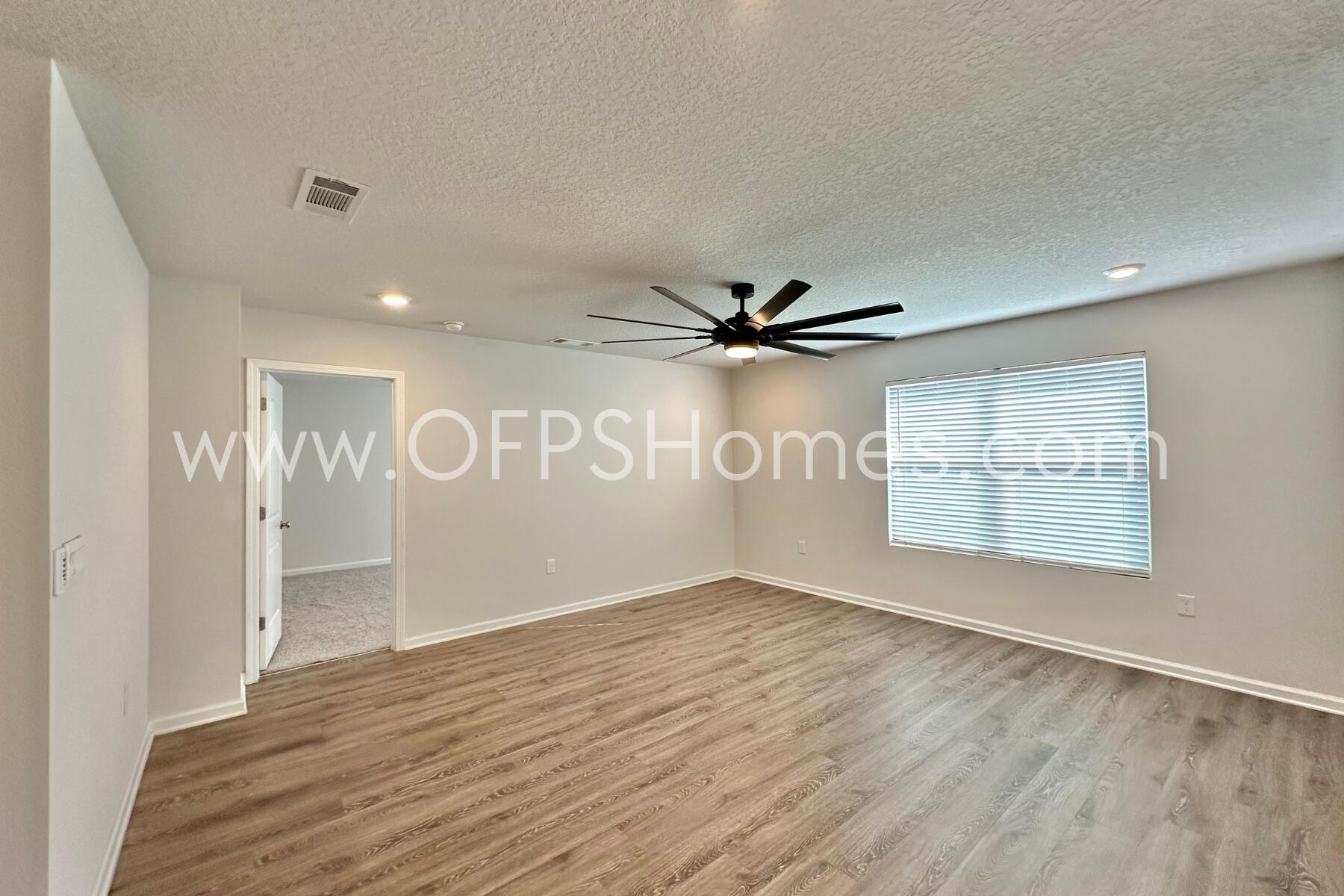 3582 Sugar Maple Lane Crestview, FL 32539 - Photo 21 of 33 a view of an empty room with a window