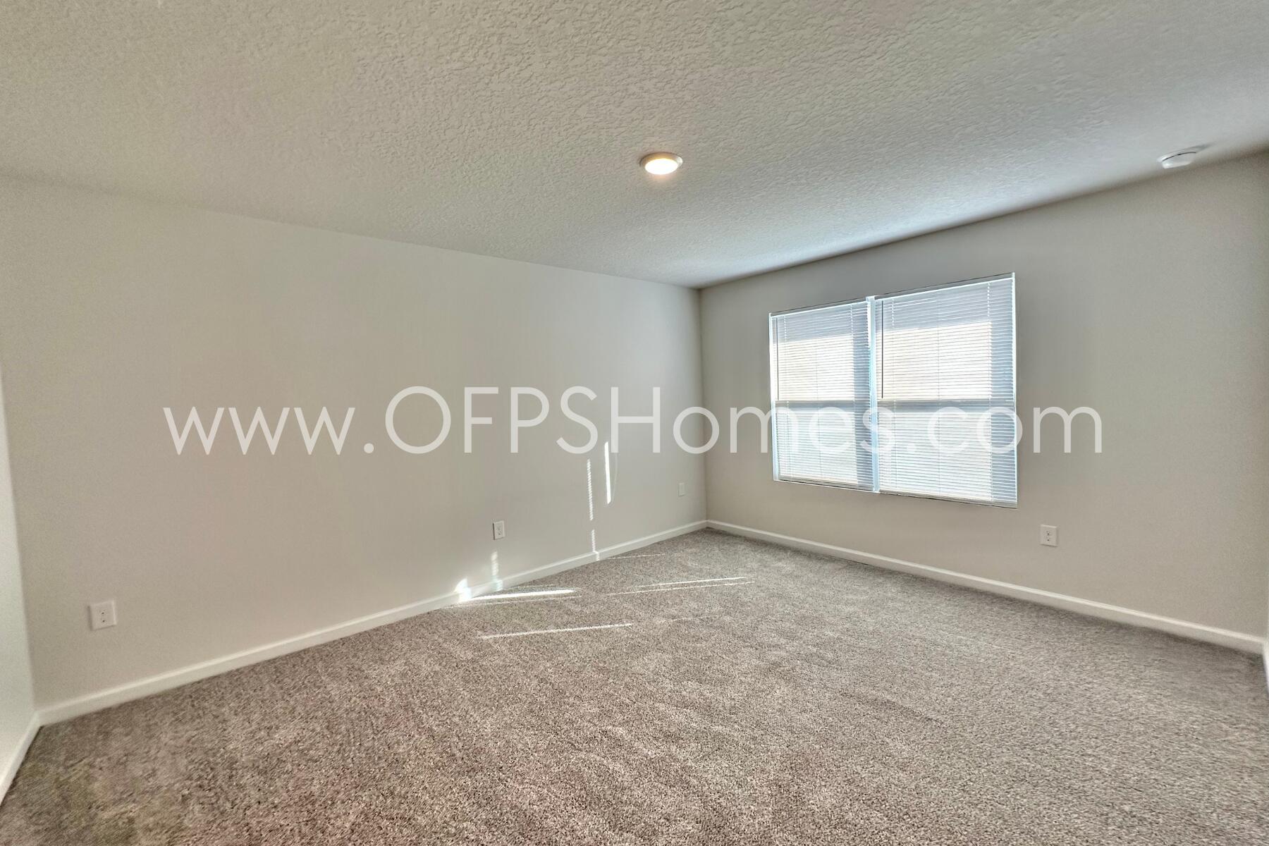 3582 Sugar Maple Lane Crestview, FL 32539 - Photo 26 of 33 an empty room with windows