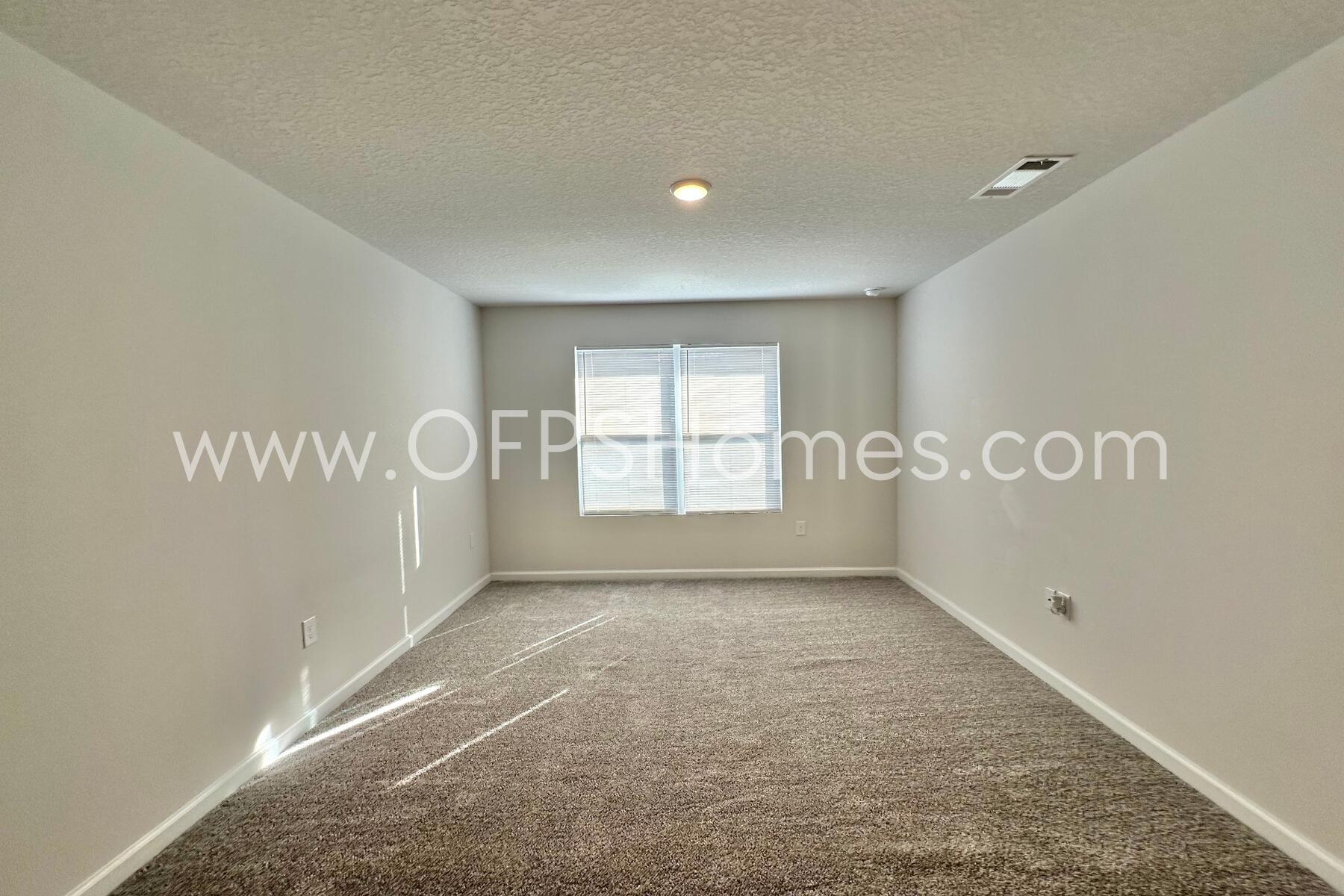 3582 Sugar Maple Lane Crestview, FL 32539 - Photo 27 of 33 a view of an empty room with a window