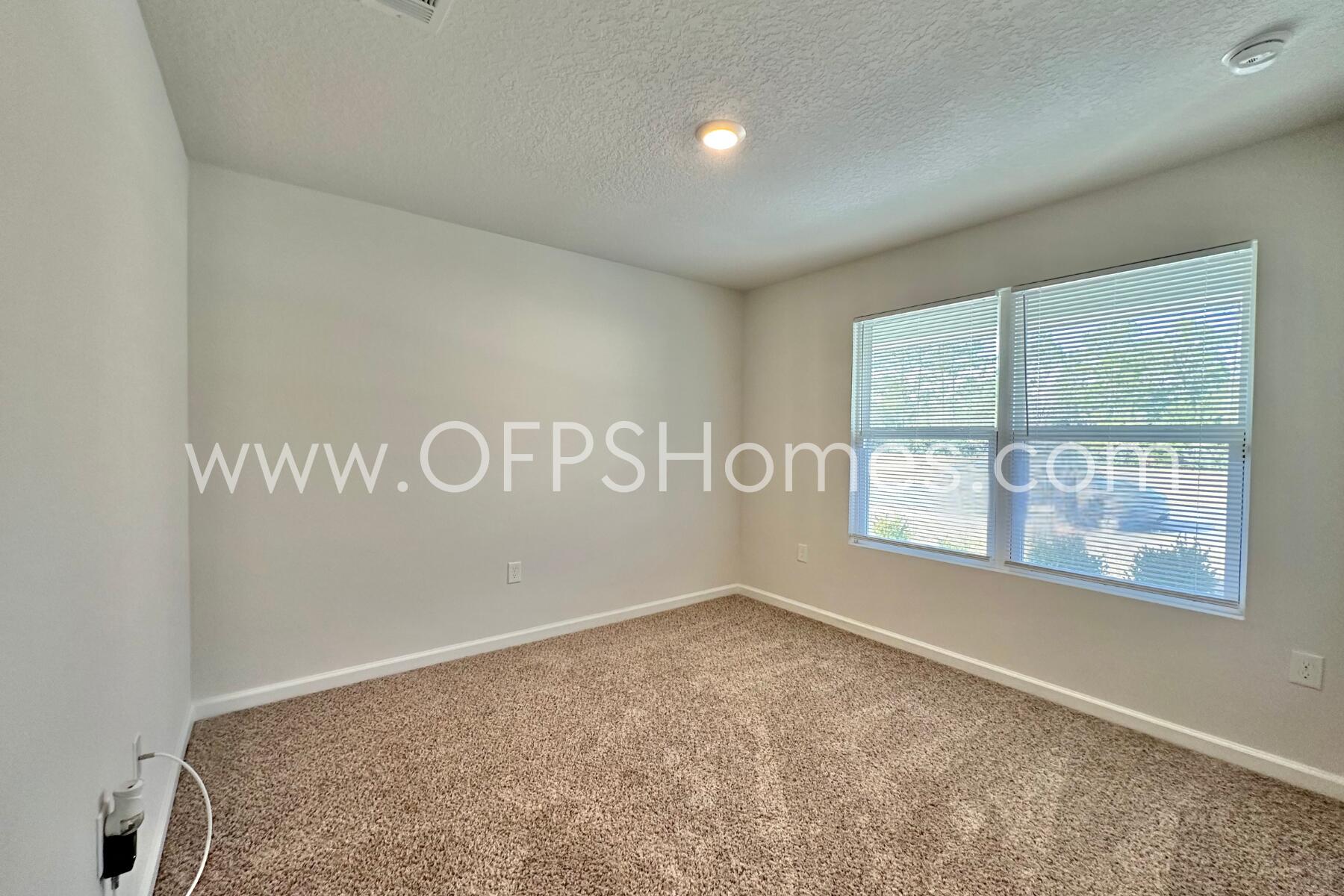 3582 Sugar Maple Lane Crestview, FL 32539 - Photo 5 of 33 an empty room with windows