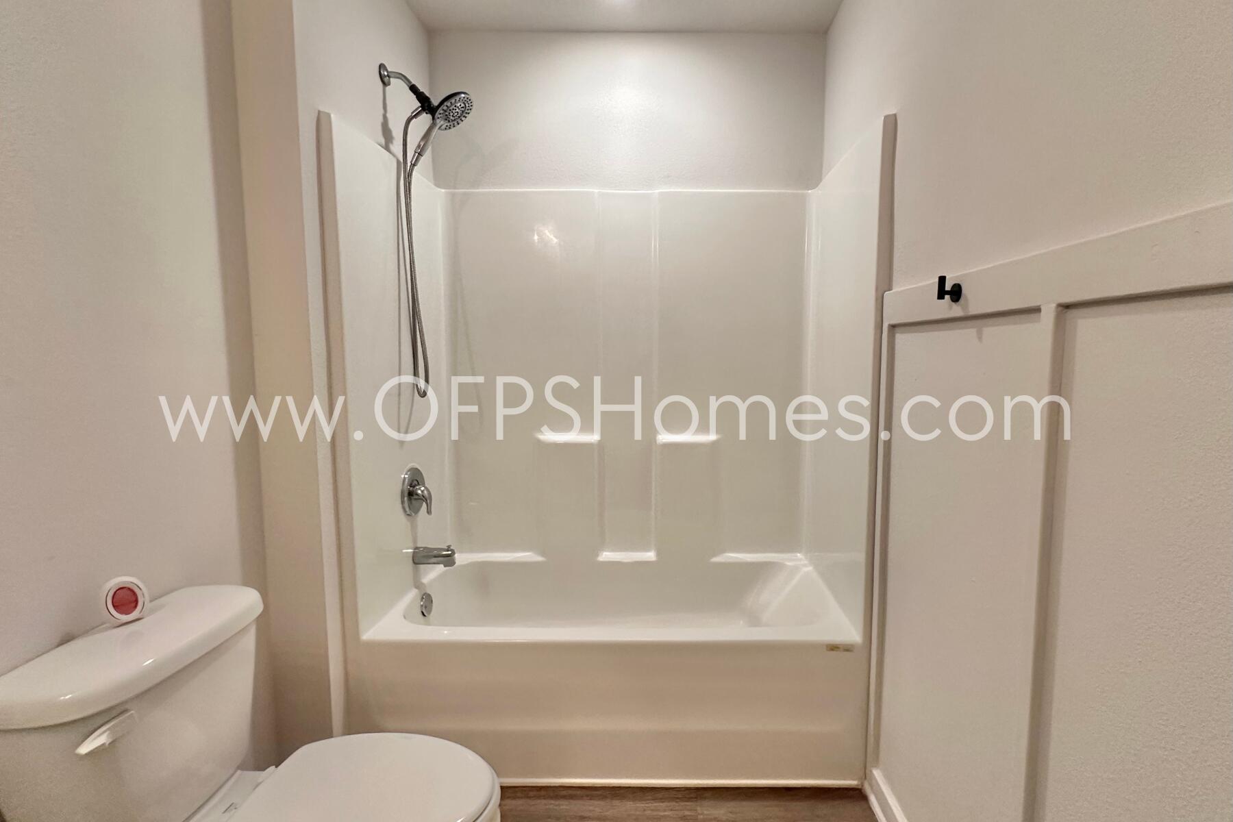 3582 Sugar Maple Lane Crestview, FL 32539 - Photo 8 of 33 a bathroom with a shower and a toilet