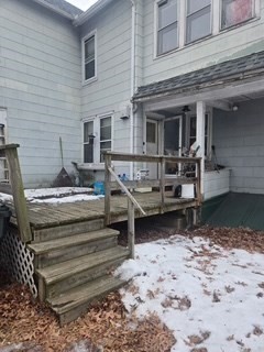 17 Spencer Street Springfield, MA 01118 - Photo 4 of 14 a view of a house with backyard and sitting area