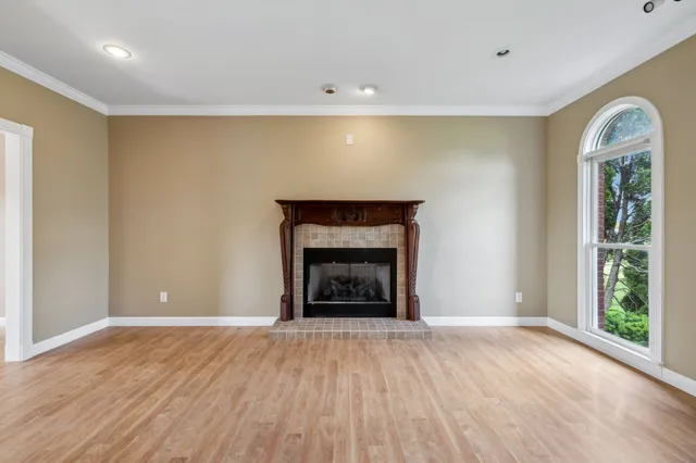 a kitchen with stainless steel appliances granite countertop a sink and a stove