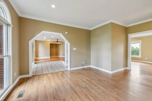 a kitchen with stainless steel appliances granite countertop a sink and cabinets
