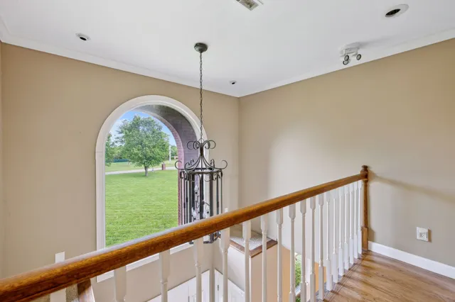 a view of a bathroom with a shower and a sink