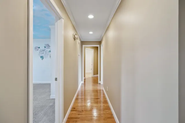 a spacious bathroom with a double vanity sink and a mirror