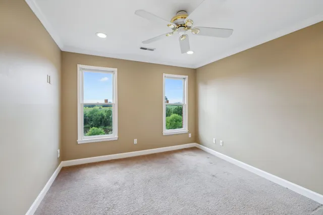 a view of balcony with wooden floor