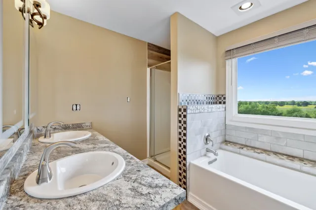 a view of a golf course with a lake