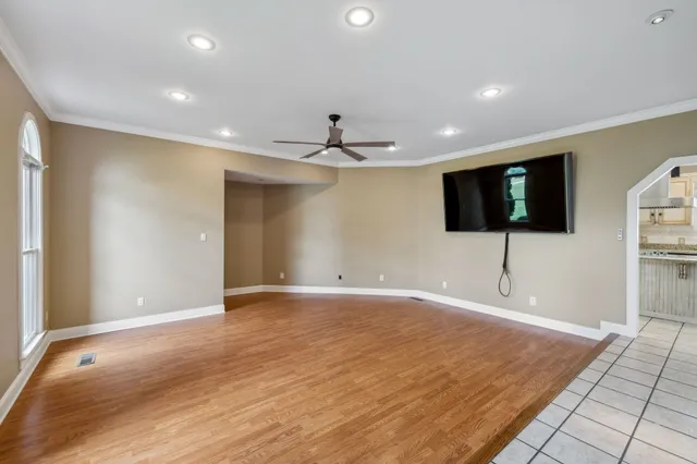 a view of entryway and hall with a front door