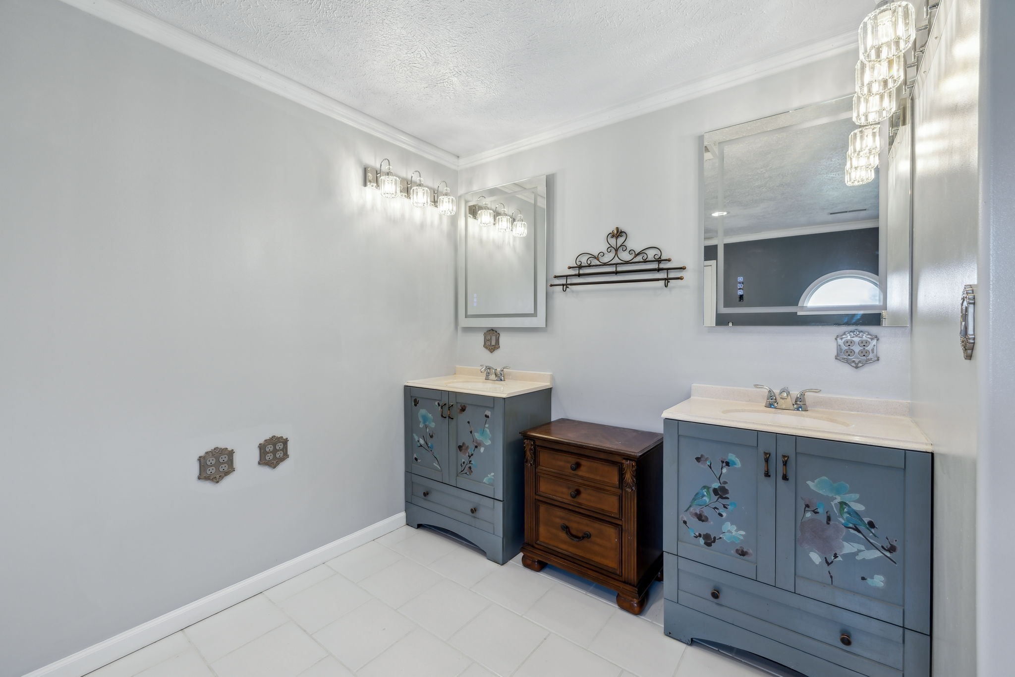 122 Windcrest Drive Hohenwald, TN 38462 - Photo 64 of 94 a spacious bathroom with a double vanity sink and a mirror