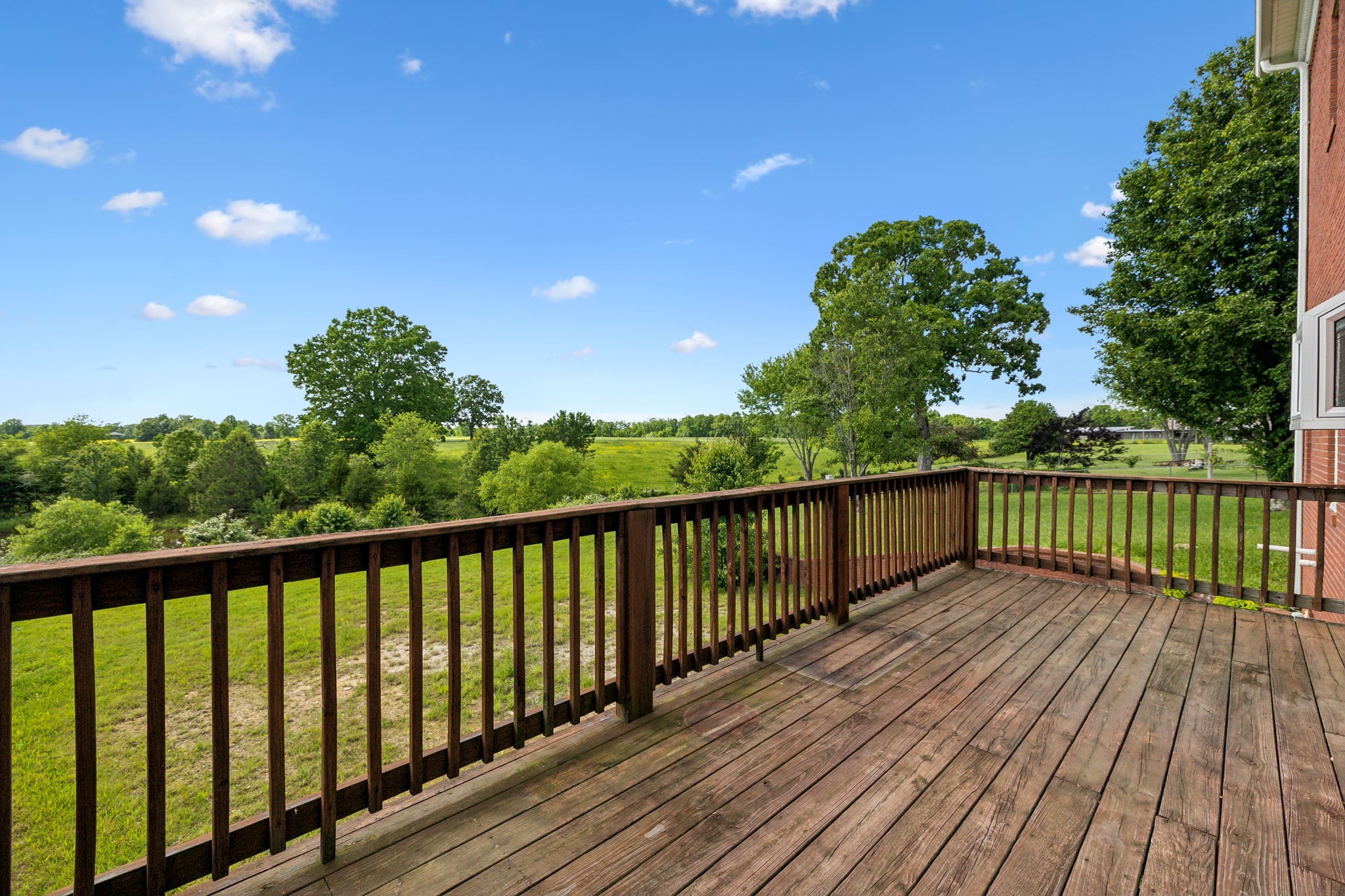 122 Windcrest Drive Hohenwald, TN 38462 - Photo 70 of 94 a view of balcony with wooden floor