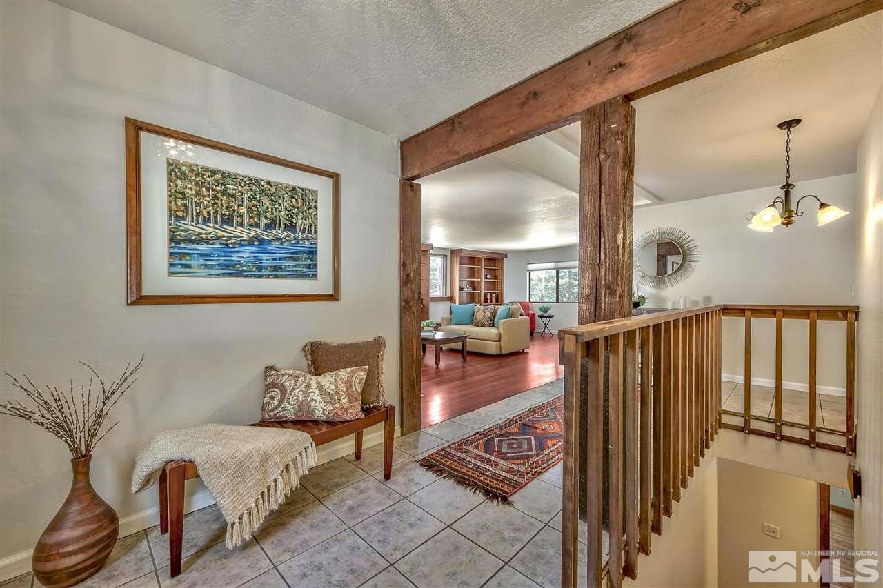 170 Chimney Rock Road Stateline, NV 89449 - Photo 1 of 25 a living room with furniture and wooden floor