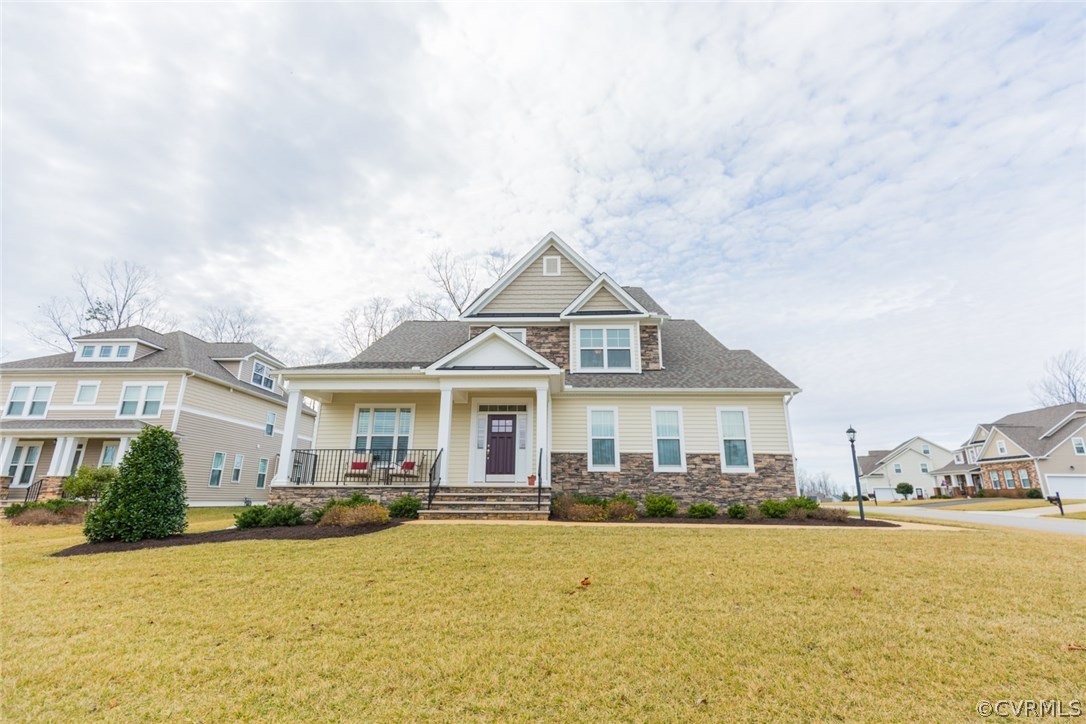 1372 Miners Trail Road Midlothian, VA 23114 - Photo 2 of 50 a front view of a house with yard and balcony