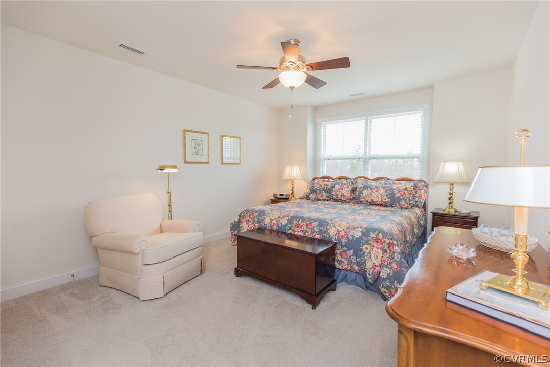 1372 Miners Trail Road Midlothian, VA 23114 - Photo 36 of 50 a bedroom with a bed and a chandelier