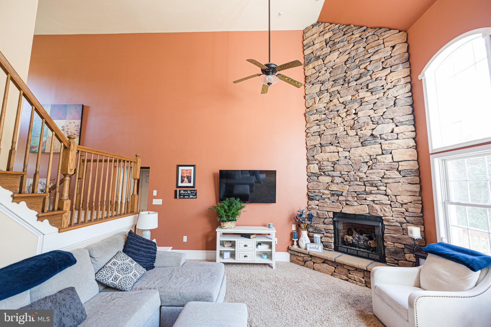 2561 Cedar Ridge Drive Westminster, MD 21158 - Photo 21 of 38 a living room with furniture and a fireplace