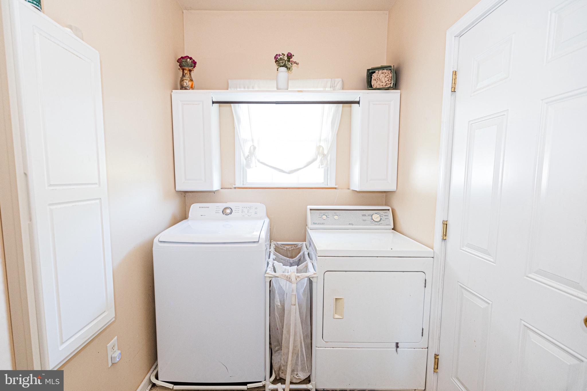 2561 Cedar Ridge Drive Westminster, MD 21158 - Photo 23 of 38 a utility room with dryer and washer