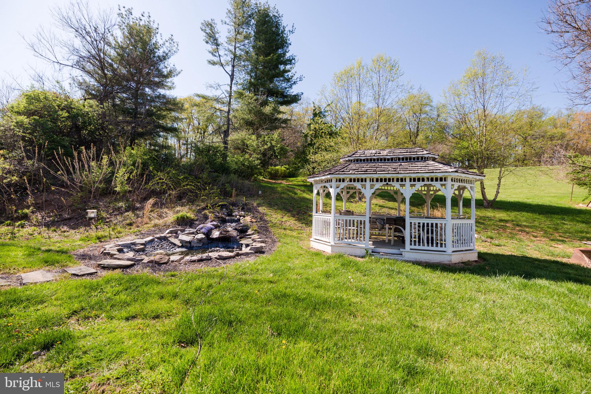 2561 Cedar Ridge Drive Westminster, MD 21158 - Photo 26 of 38 a view of a house with a big yard and large trees