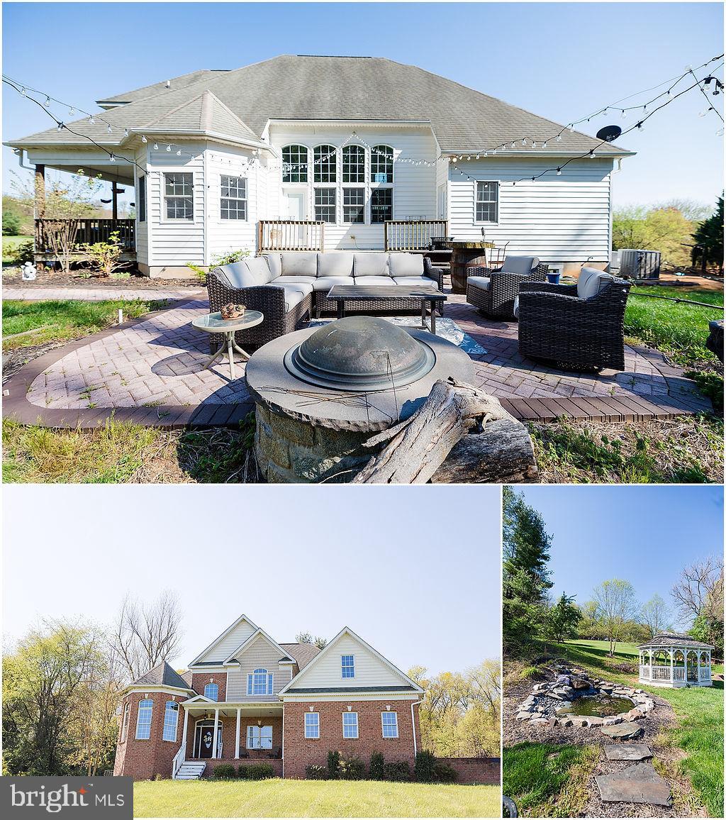 2561 Cedar Ridge Drive Westminster, MD 21158 - Photo 30 of 38 a aerial view of a house with swimming pool and a yard
