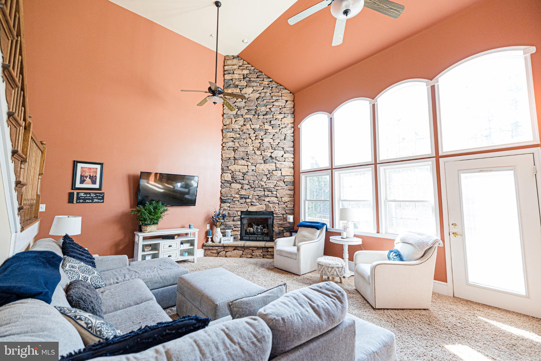 2561 Cedar Ridge Drive Westminster, MD 21158 - Photo 6 of 38 a living room with furniture and a large window