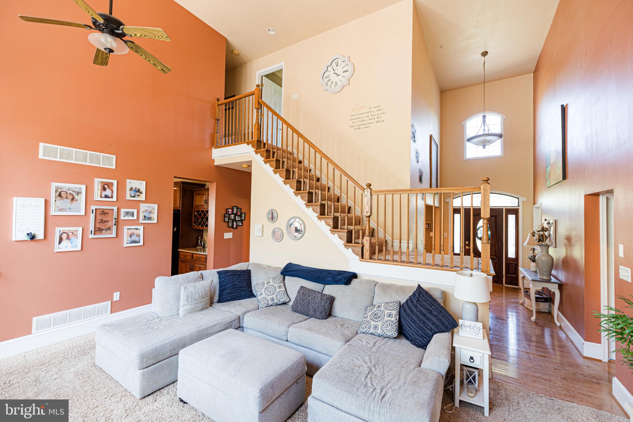 2561 Cedar Ridge Drive Westminster, MD 21158 - Photo 7 of 38 a living room with furniture and wooden floor