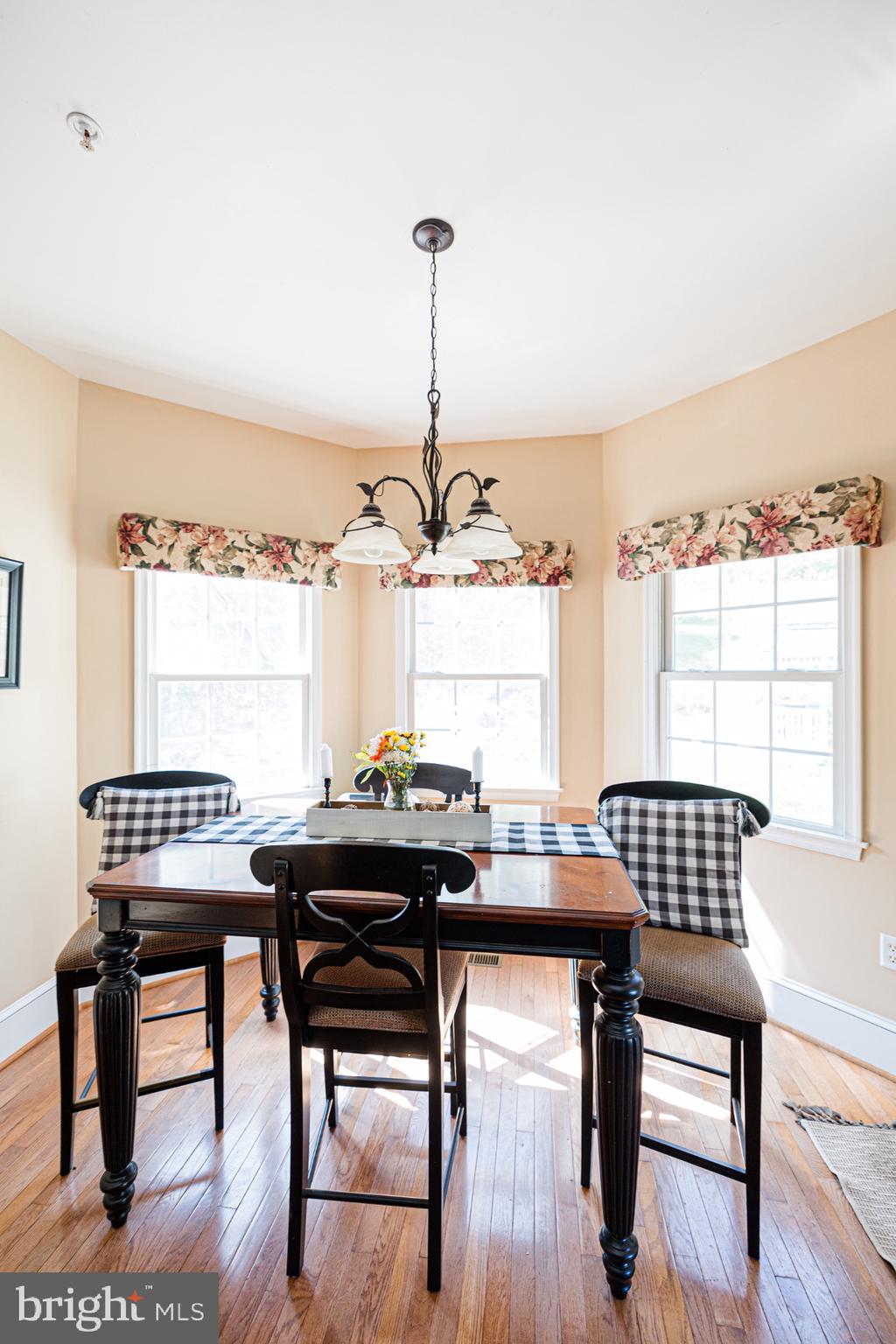 2561 Cedar Ridge Drive Westminster, MD 21158 - Photo 8 of 38 a table and chairs in a room