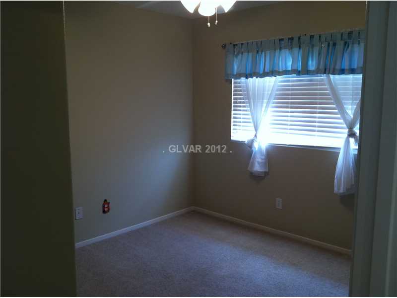 10166 Rice Paper Street Las Vegas, NV 89183 - Photo 23 of 34 Bedroom.