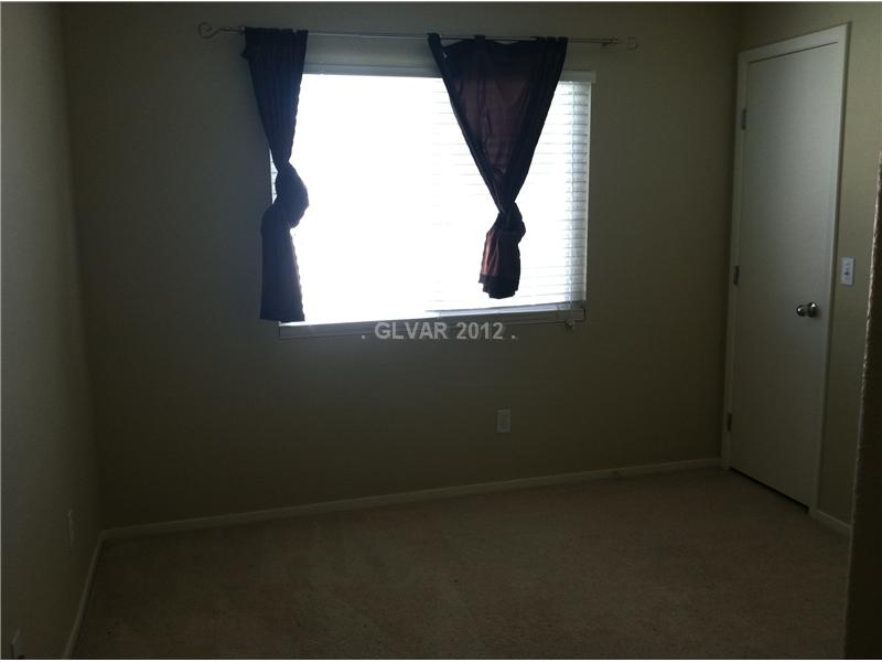 10166 Rice Paper Street Las Vegas, NV 89183 - Photo 26 of 34 Bedroom.