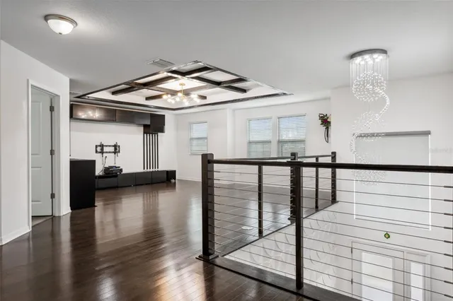 a view of livingroom with furniture and hardwood floor