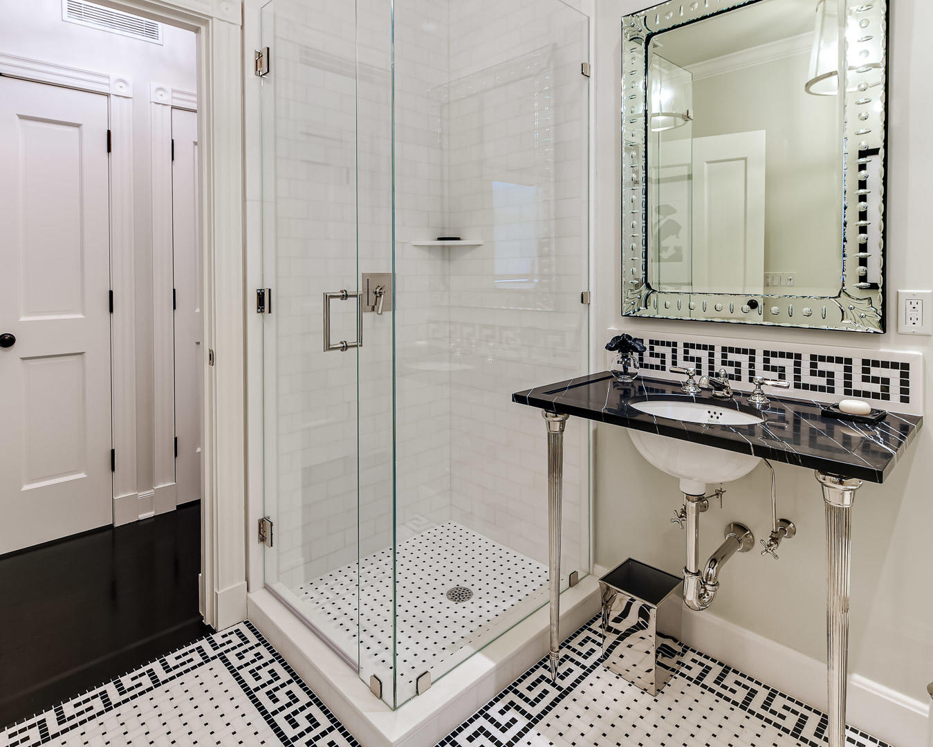 130 Cocoanut Row Palm Beach, FL 33480 - Photo 18 of 31 a bathroom with a sink and a mirror