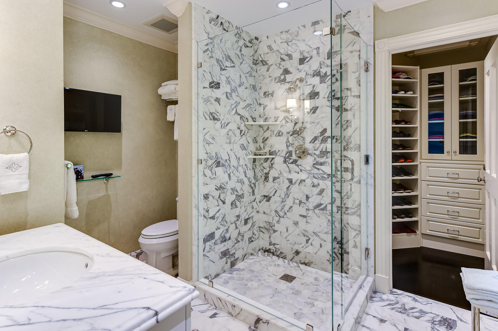 130 Cocoanut Row Palm Beach, FL 33480 - Photo 23 of 31 a bathroom with a sink toilet and shower