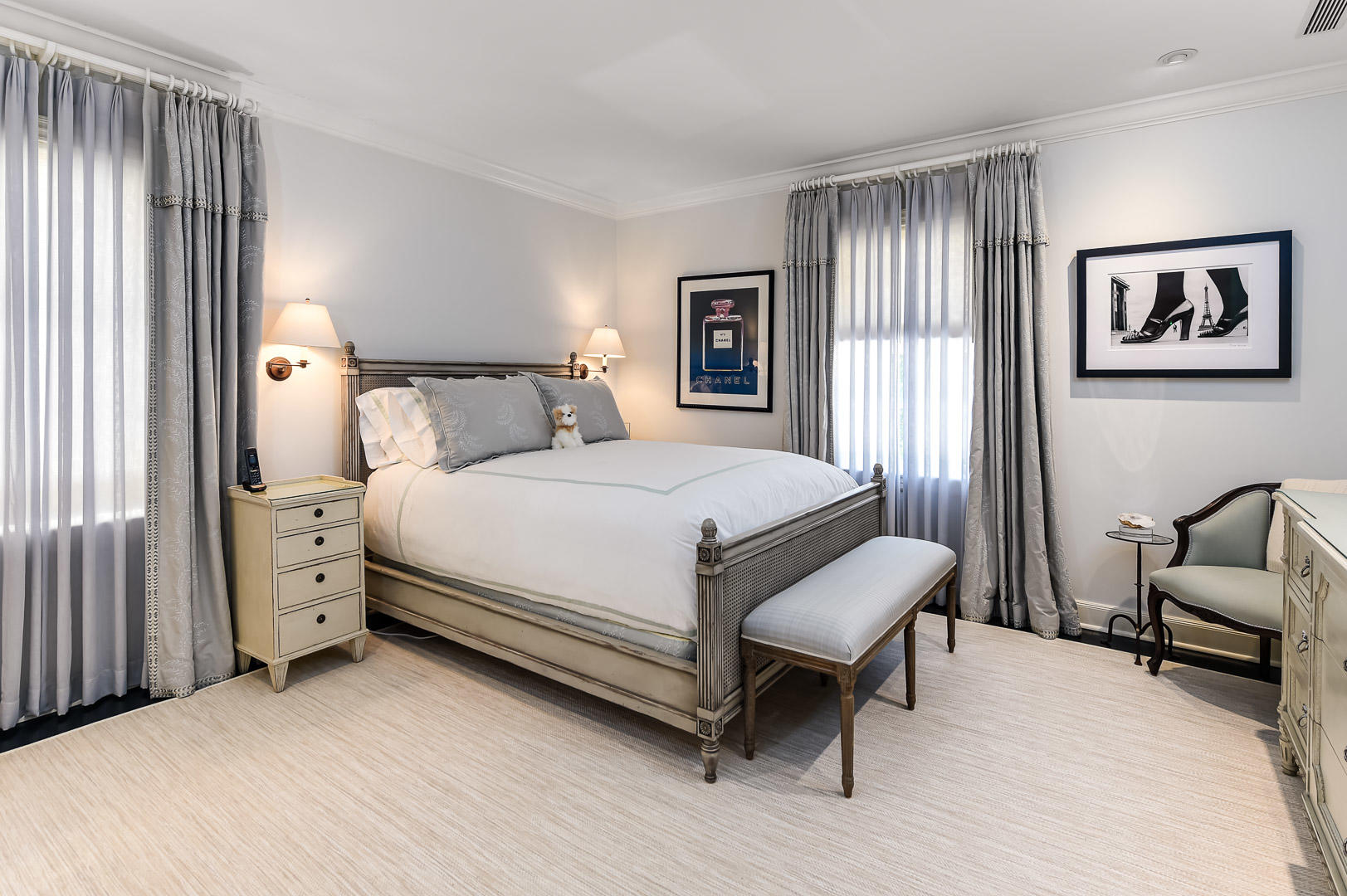 130 Cocoanut Row Palm Beach, FL 33480 - Photo 24 of 31 a bedroom with a bed and a couch