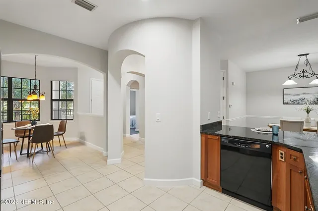 a swimming pool with outdoor seating and yard