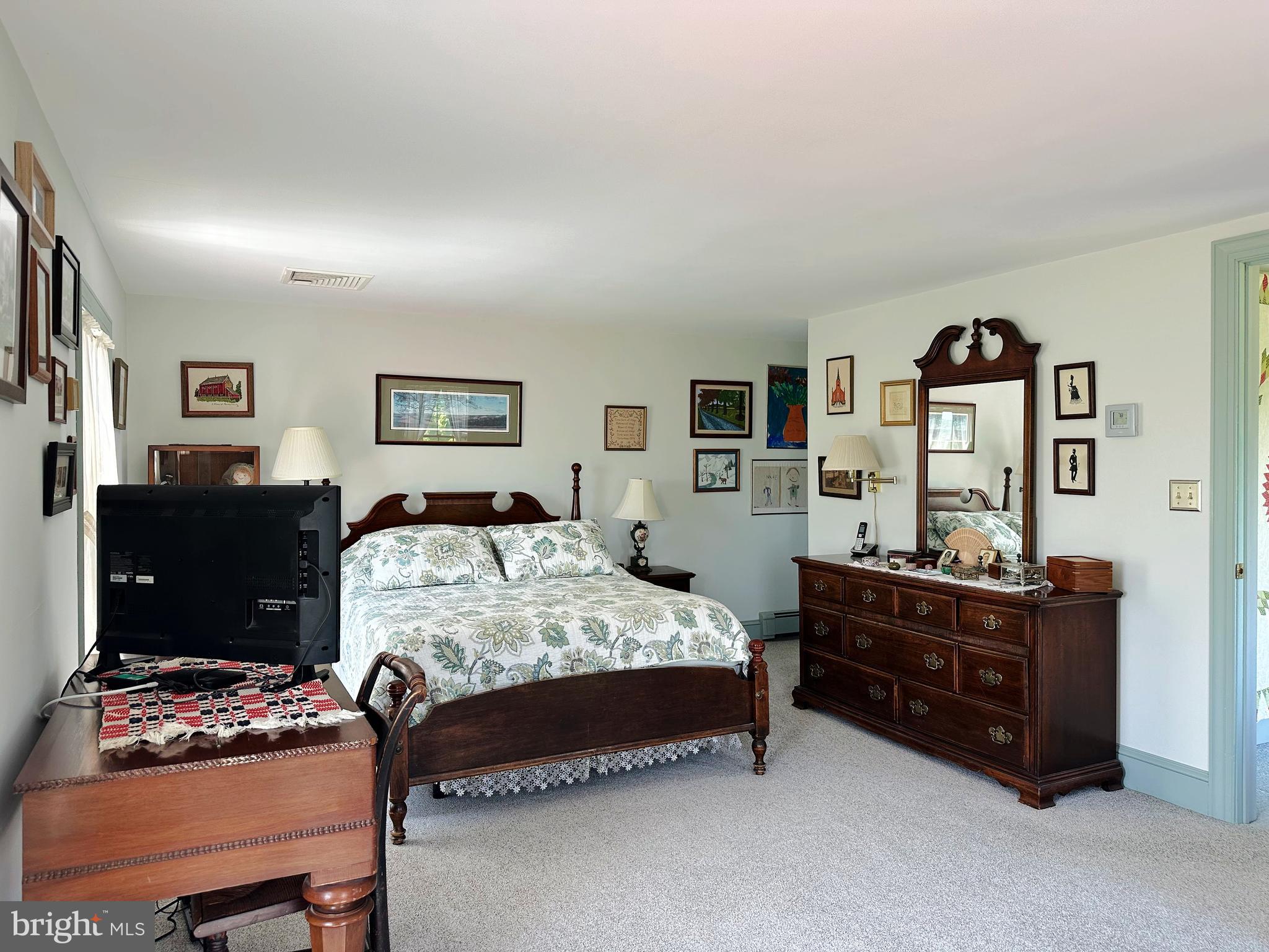 2382 Bergey Road Harleysville, PA 19438 - Photo 37 of 52 a bedroom with a bed and a dresser