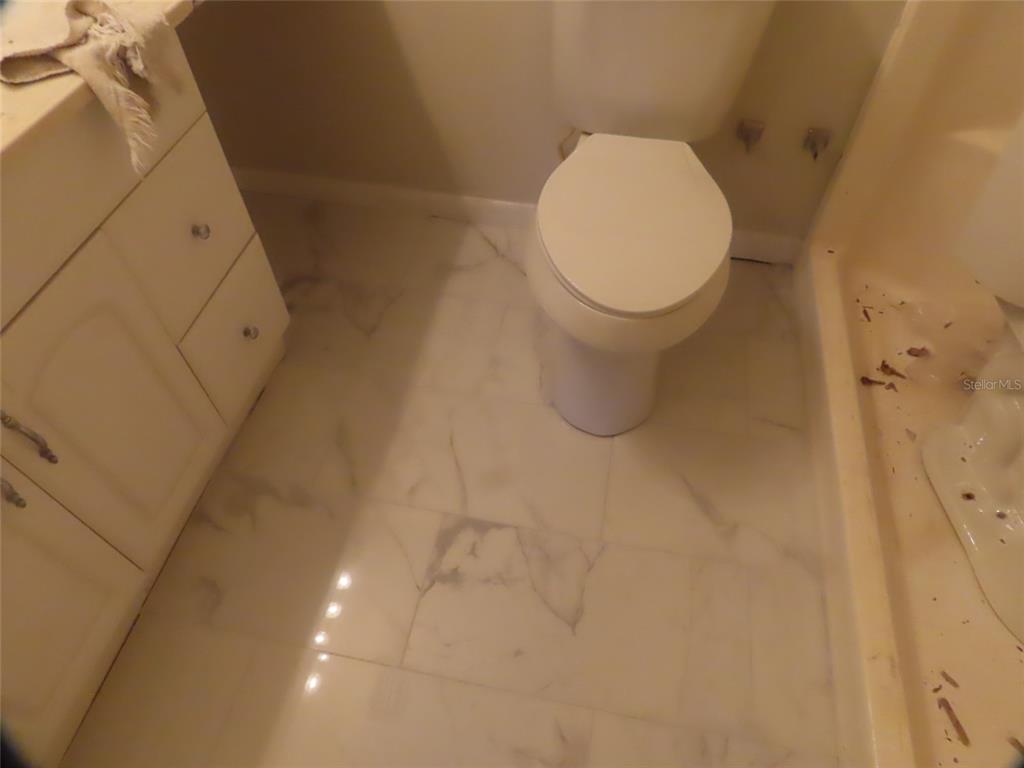 708 St Michael Lane Altamonte Springs, FL 32714 - Photo 15 of 26 a bathroom with a toilet and a shower