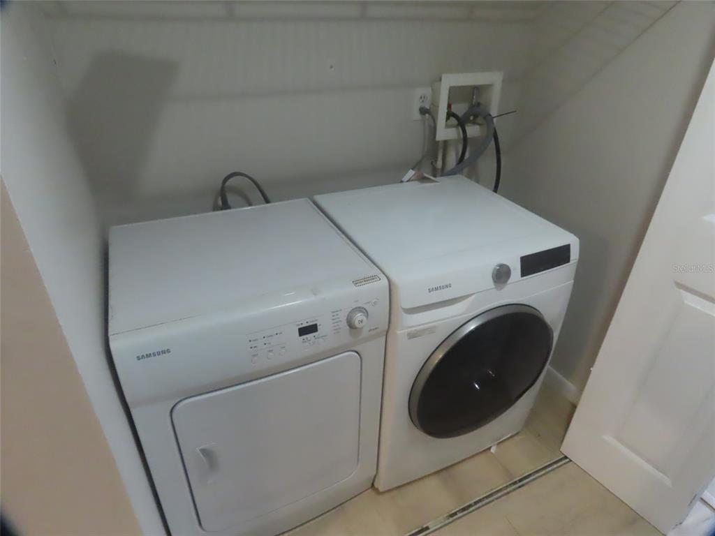 708 St Michael Lane Altamonte Springs, FL 32714 - Photo 22 of 26 a utility room with dryer and washer
