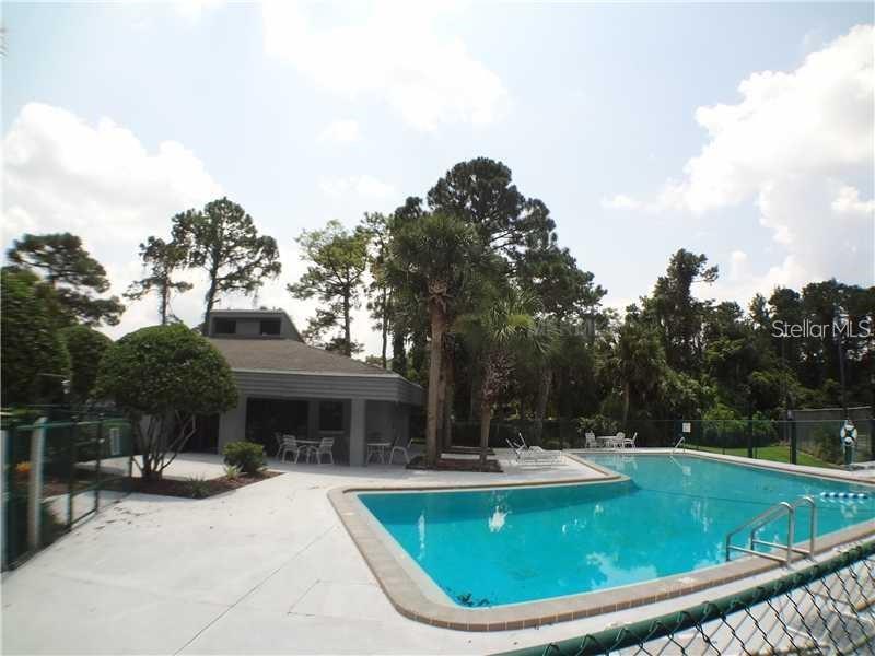 708 St Michael Lane Altamonte Springs, FL 32714 - Photo 25 of 26 a view of a swimming pool with a patio