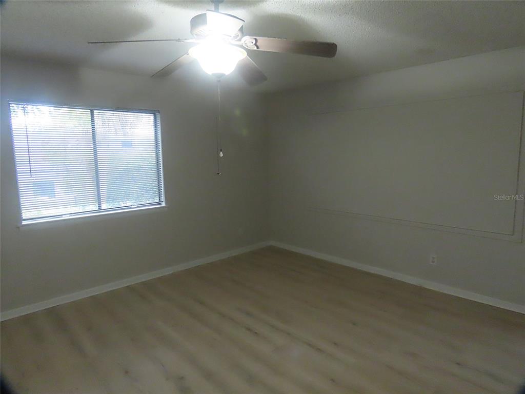 708 St Michael Lane Altamonte Springs, FL 32714 - Photo 10 of 26 an empty room with a window
