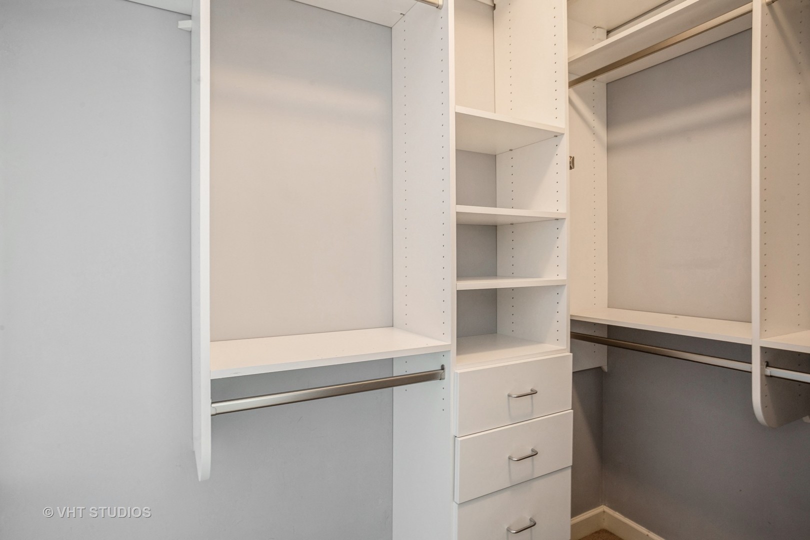 92 Legacy Lane Wheeling, IL 60090 - Photo 13 of 28 a view of an empty walk in closet