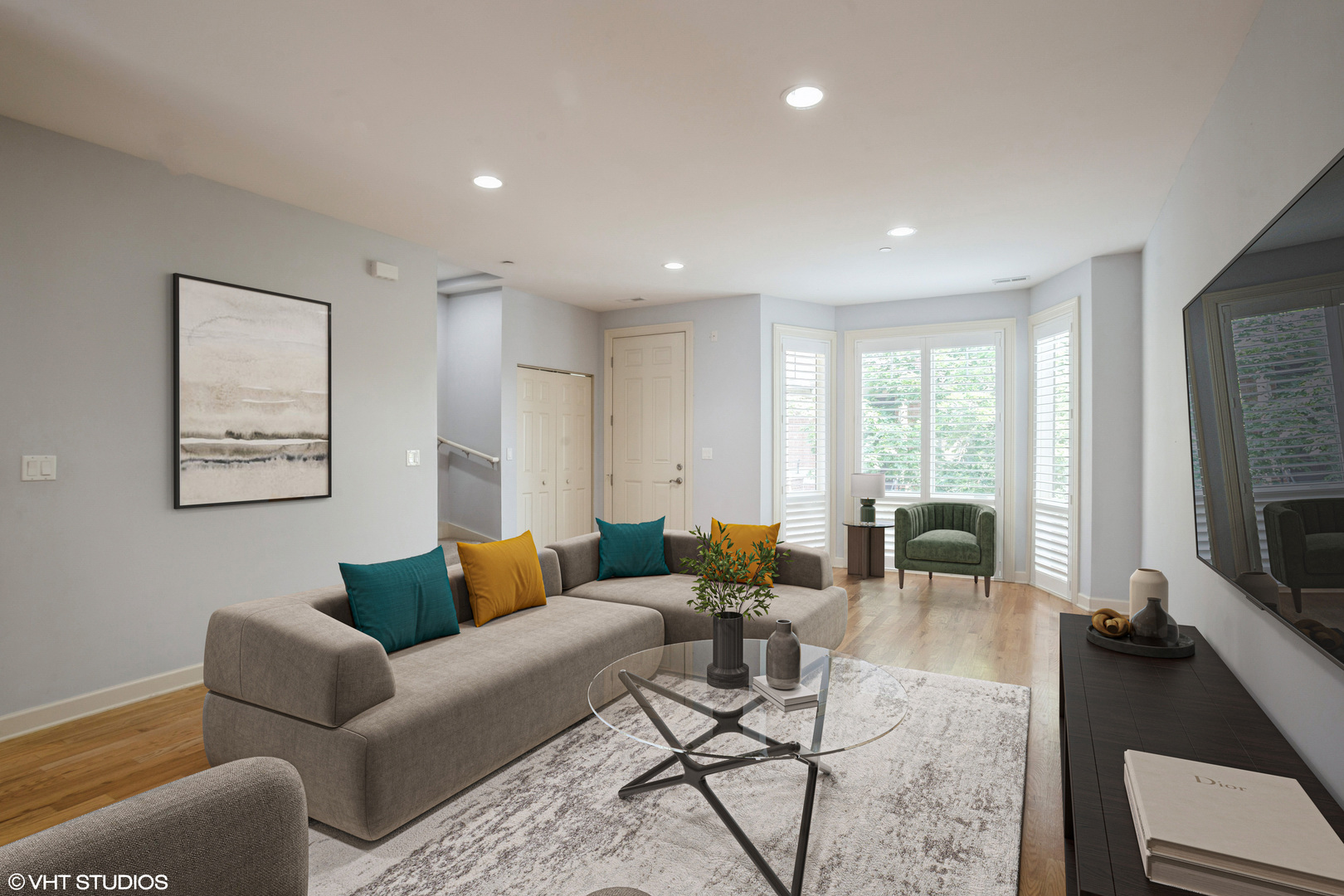92 Legacy Lane Wheeling, IL 60090 - Photo 3 of 28 a living room with furniture wooden floor and a flat screen tv
