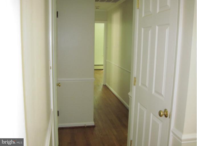 25656 Point Lookout Road Leonardtown, MD 20650 - Photo 23 of 26 Hall to bedroom area