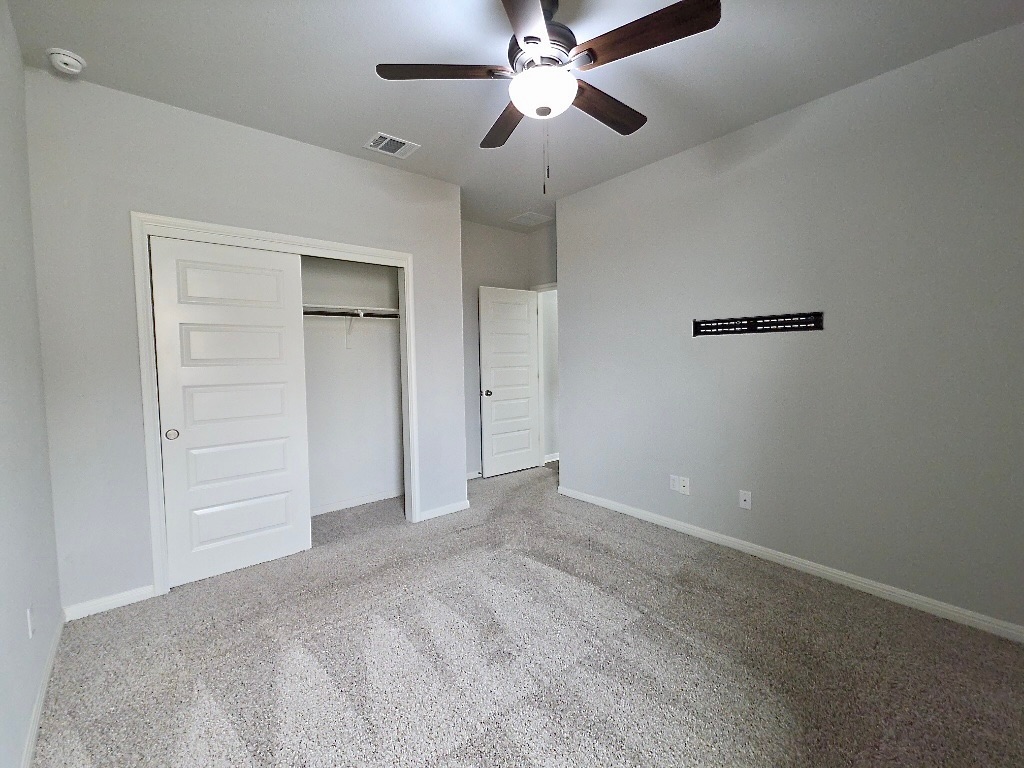 533 Rearing Mare Pass Georgetown, TX 78626 - Photo 16 of 22 a view of a livingroom with a ceiling fan
