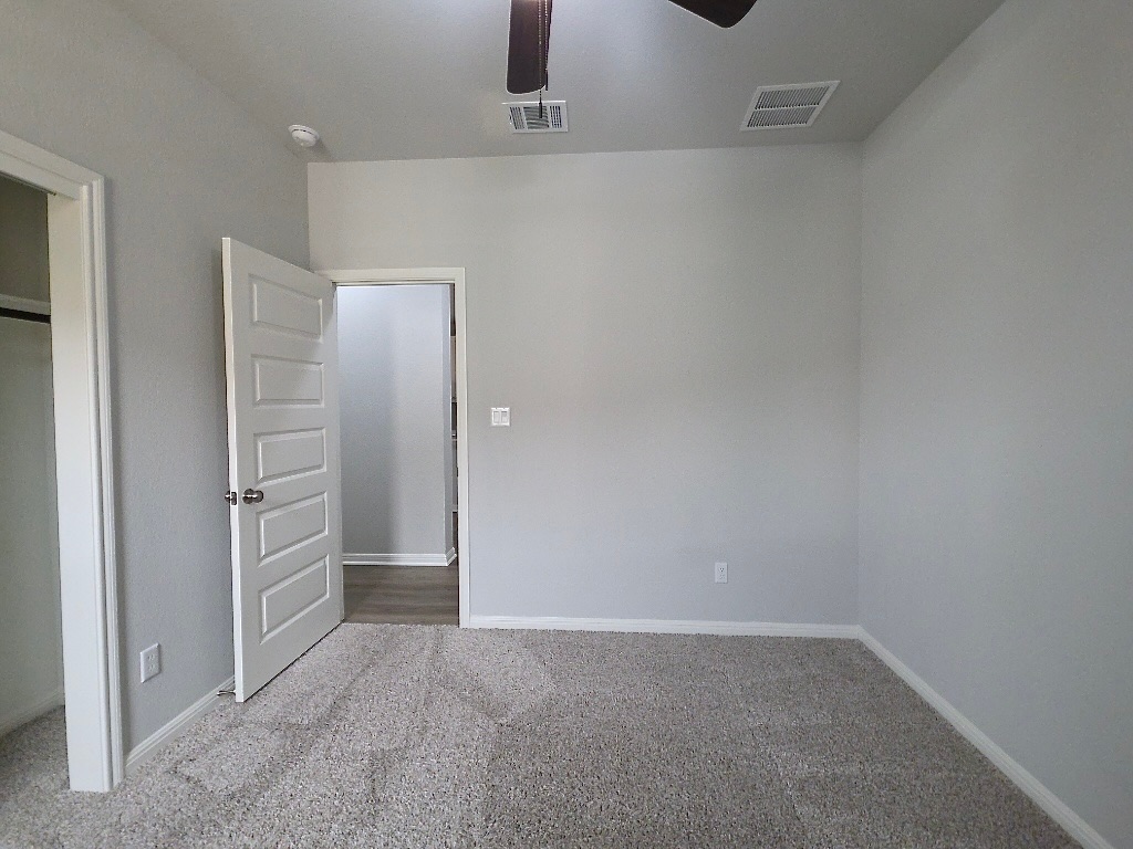 533 Rearing Mare Pass Georgetown, TX 78626 - Photo 19 of 22 wooden floor in an empty room
