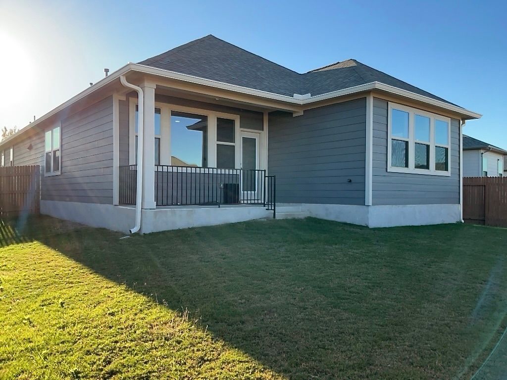 533 Rearing Mare Pass Georgetown, TX 78626 - Photo 21 of 22 a front view of a house with garden