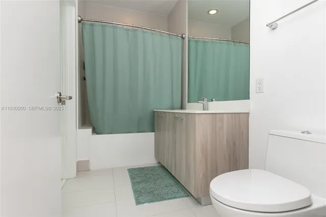 a bathroom with a sink and a shower