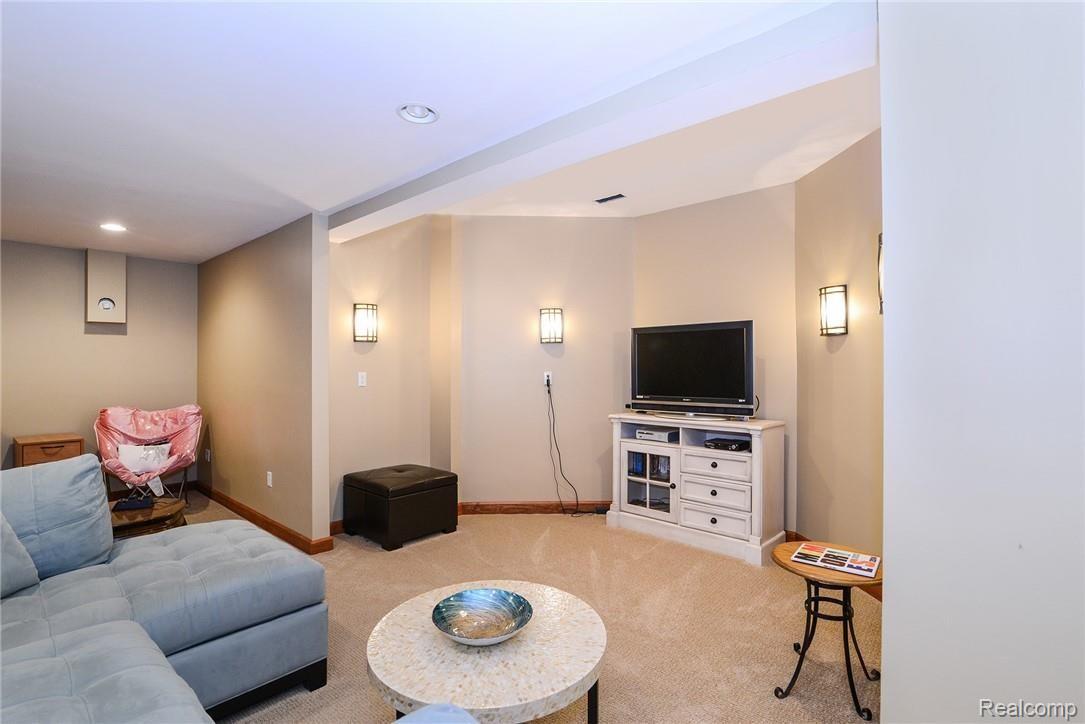 571 Timber Ridge Trail Howell, MI 48843 - Photo 30 of 38 Family room area. Great recessed lighting down here!