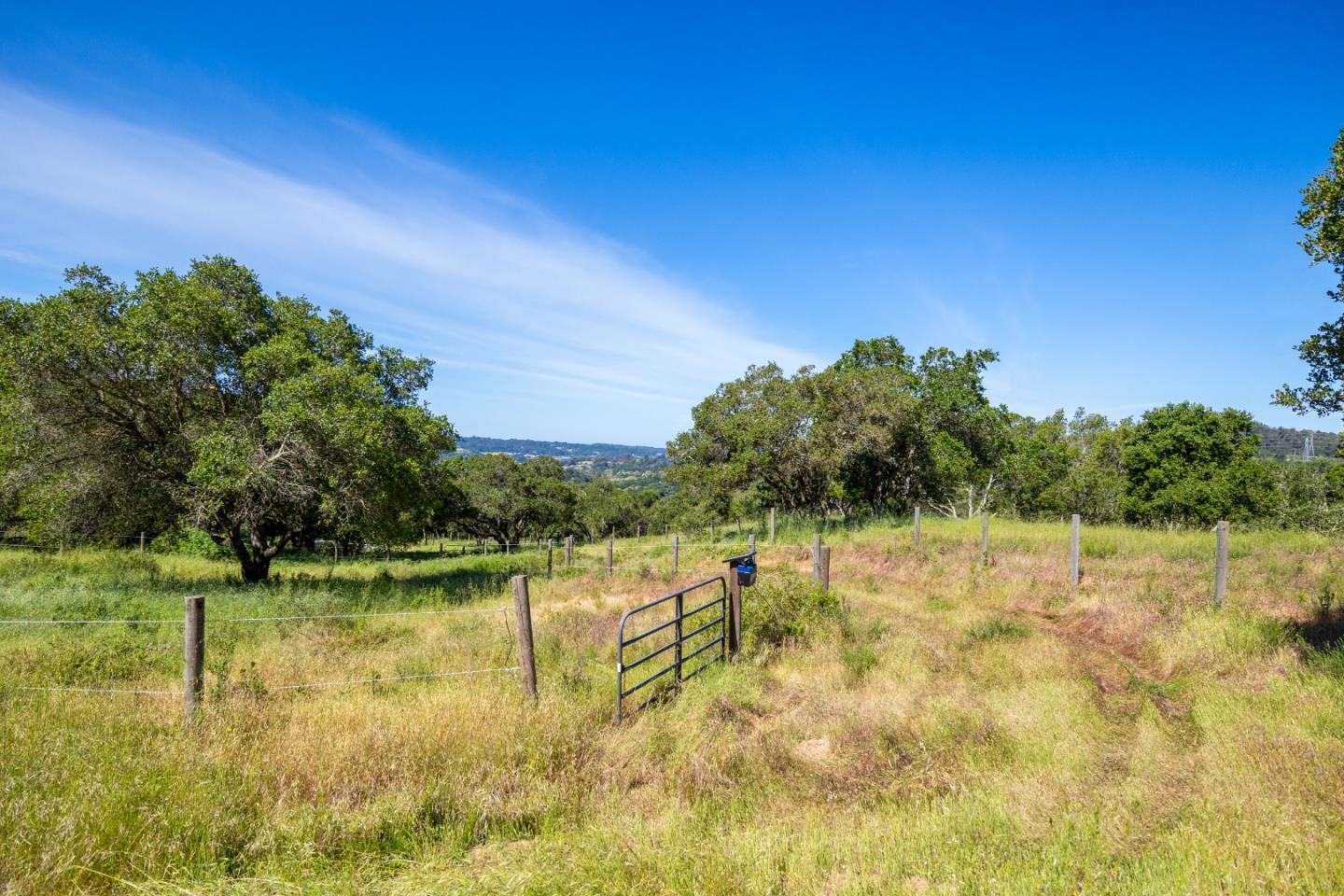 San Juan Road Aromas, CA 95004 - Photo 33 of 46 a view of a lake with houses in the background