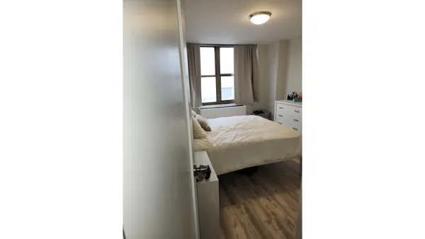 a bathroom with a sink a mirror and a toilet