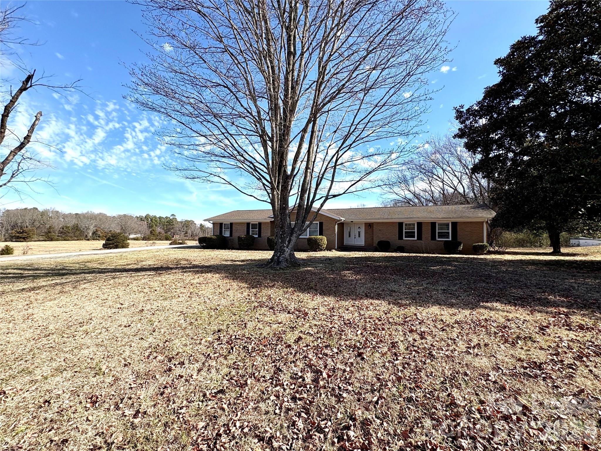 2801 Potter Road Waxhaw, NC 28173 - Photo 3 of 4 a view of house with yard in front of it