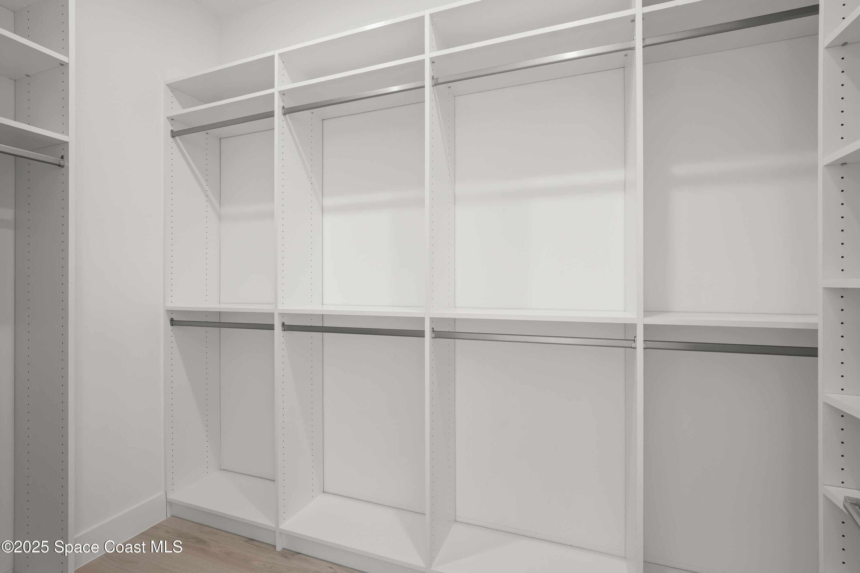 225 Strand Drive, Unit 406 Melbourne Beach, FL 32951 - Photo 27 of 49 a view of an empty walk in closet