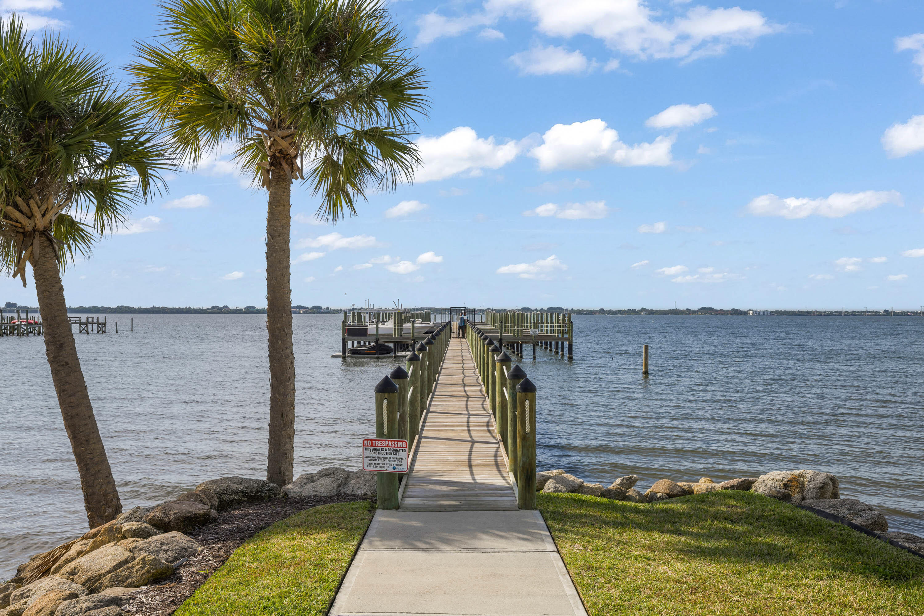 225 Strand Drive, Unit 406 Melbourne Beach, FL 32951 - Photo 38 of 49 a view of a terrace with a garden